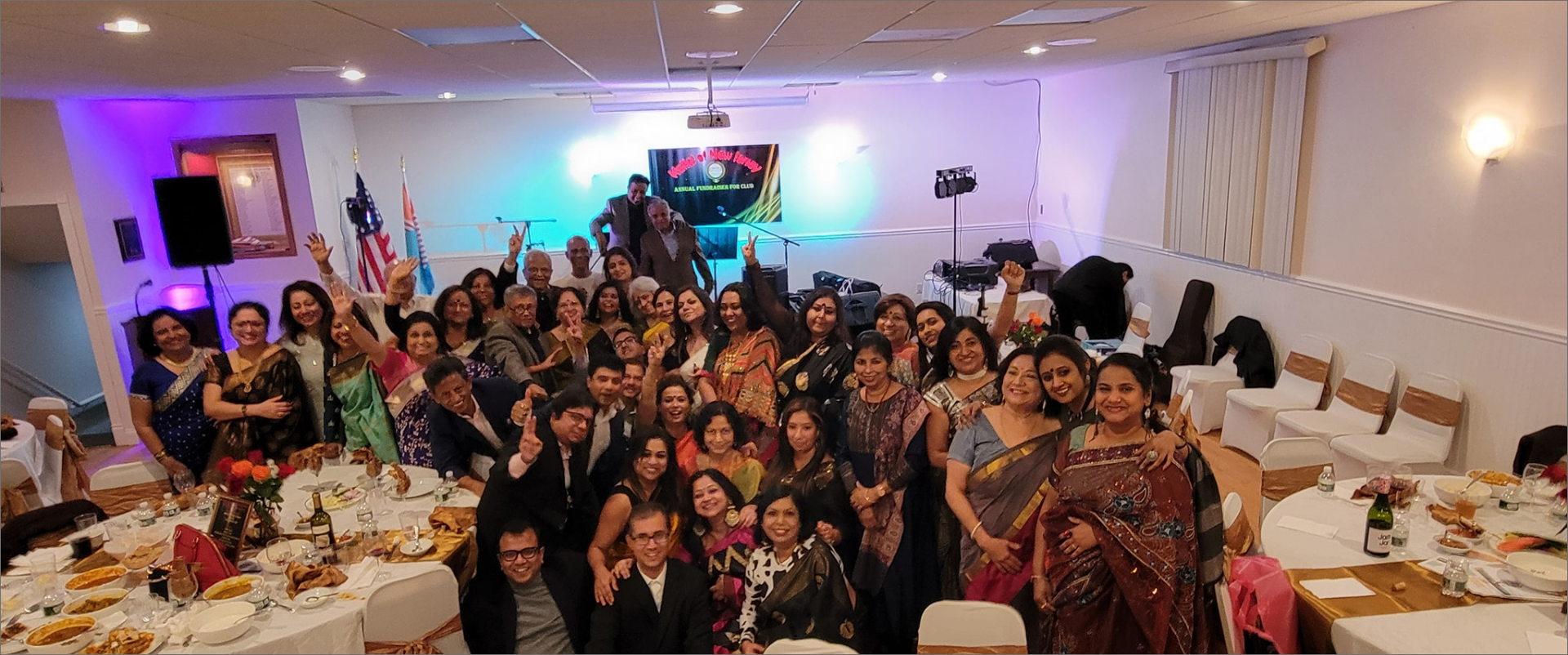 Indoor community gathering at Kallol Club House
